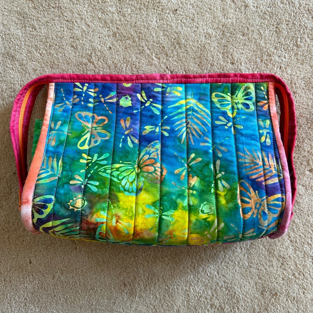 Travel essentials Batik zip around with 4 zip slots inside.  9.5” by 7”.